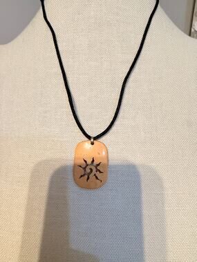 Vintage adjustable Carved Coconut Shell Sun Pendant Necklace